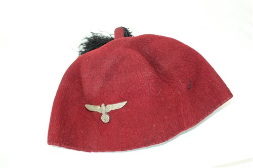 Lot 670 - Second World War Nazi fez with Eagle and...