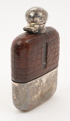 Lot 290 - SIlver and crocodile skin hip flask