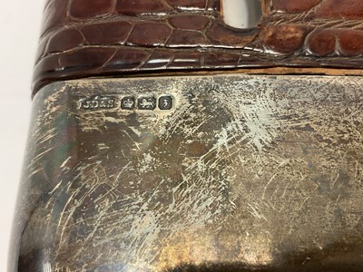 Lot 290 - SIlver and crocodile skin hip flask
