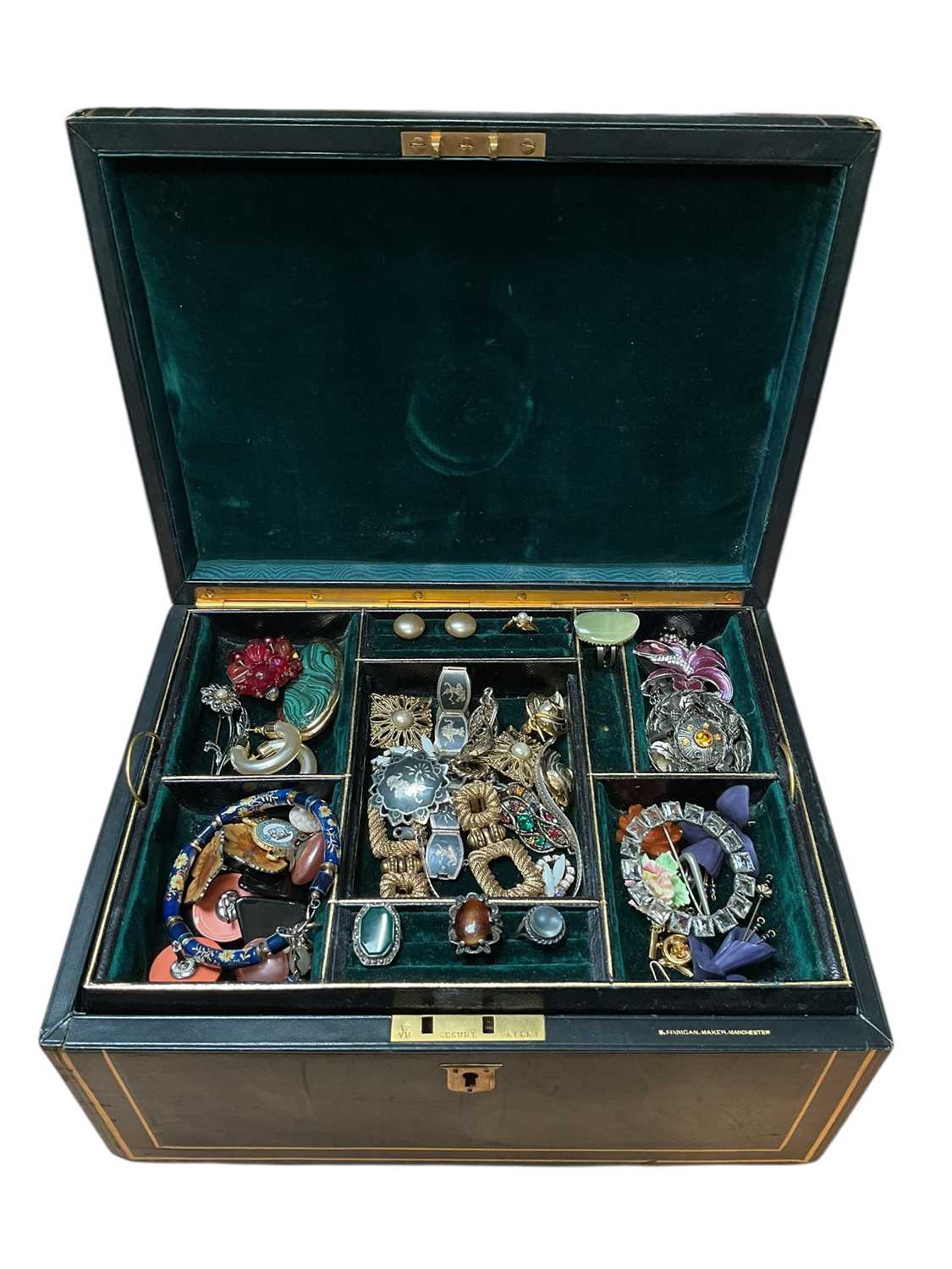 Lot 35 - Victorian leather jewellery box containing vintage costume jewellery and bijouterie including a 1970s silver bangle