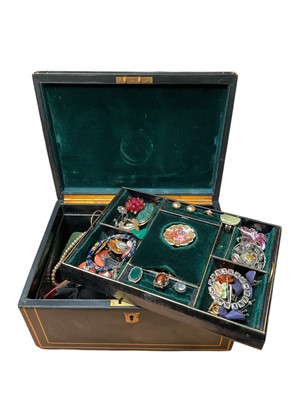 Lot 35 - Victorian leather jewellery box containing vintage costume jewellery and bijouterie including a 1970s silver bangle