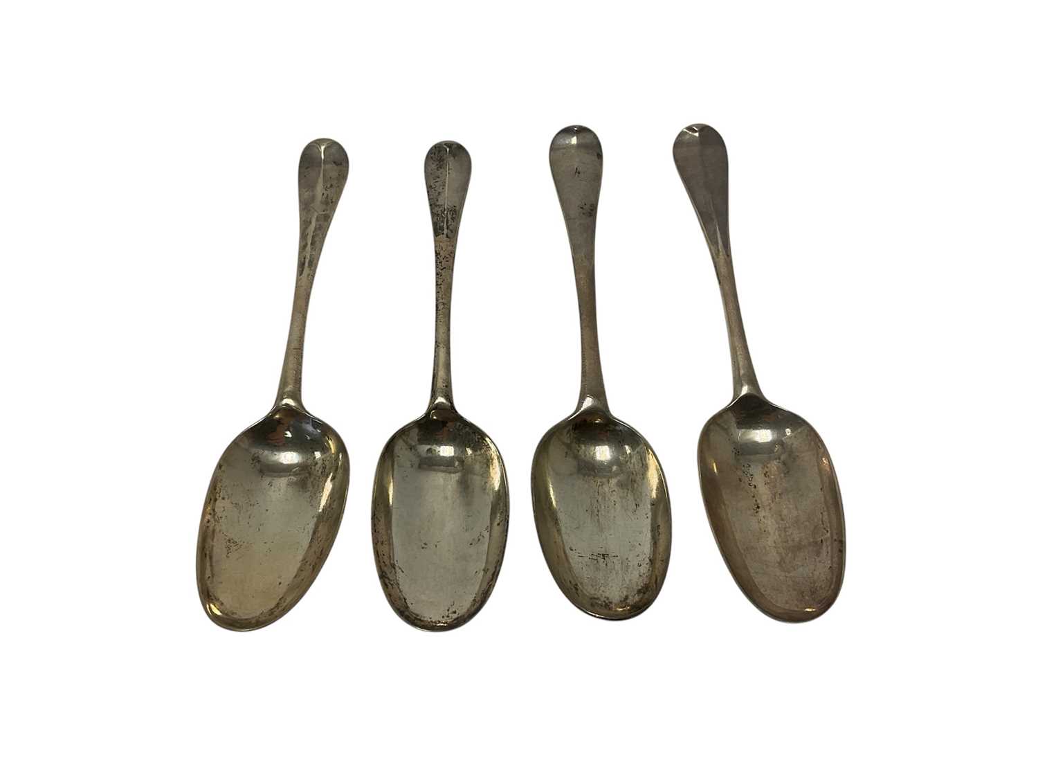 Lot 281 - Four early 18th century silver Hanoverian Rat Tail pattern table spoons