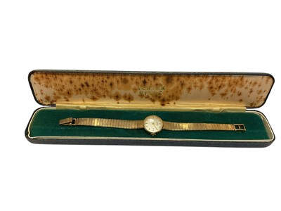 Lot 134 - 9ct gold Vertex Revue ladies wristwatch on an integral 9ct gold bracelet, boxed