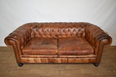 Lot 5289 - Antique button leather Chesterfield sofa