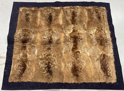 Lot 912 - Fur pelt rug on felt backing, fur measures 100cm x 120cm