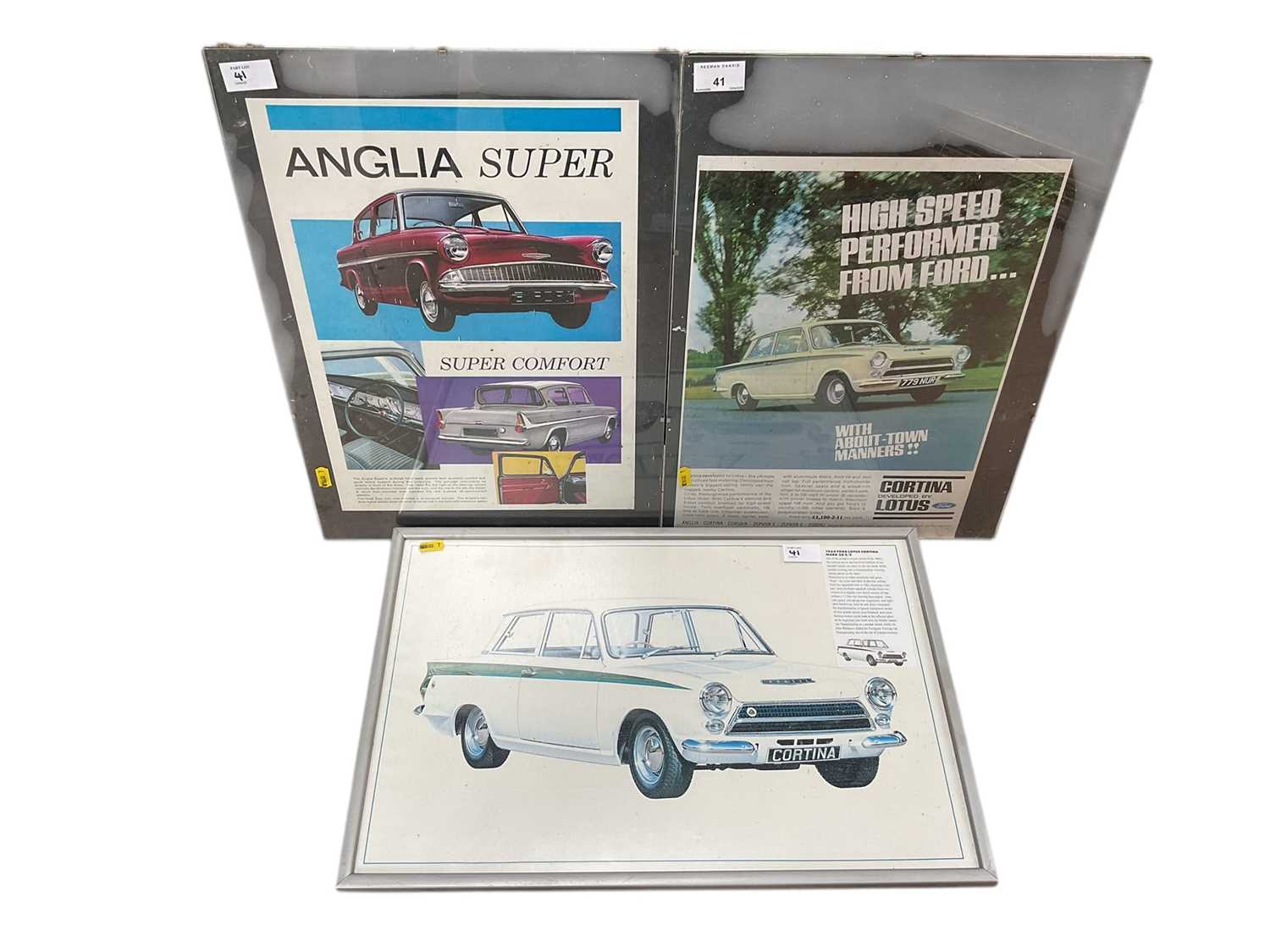 Lot 41 - Group of three framed Ford Motor Company posters, believed to have been removed from Ford at Boreham, together with other car signs.
