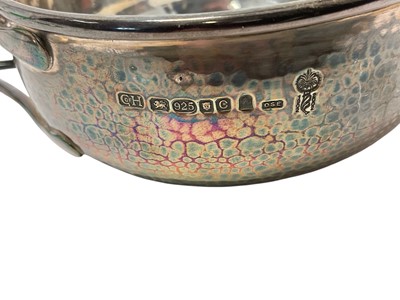 Lot 294 - Contemporary silver Guild of Handicraft silver porringer and spoon in the Arts & Crafts style