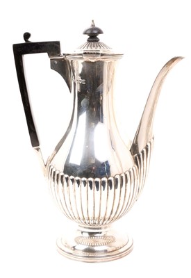 Lot 499 - Edwardian silver coffee pot of baluster form, with half fluted decoration