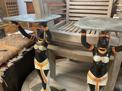 Lot 918 - Pair of Art Deco style cast iron table pedestals, with Egyptian figural supports on stepped spread base, 71cm high