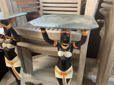 Lot 918 - Pair of Art Deco style cast iron table pedestals, with Egyptian figural supports on stepped spread base, 71cm high