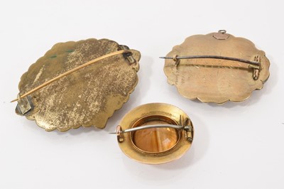 Lot 508 - Two early Victorian mourning brooches and a Victorian citrine/cairngorm brooch (3)