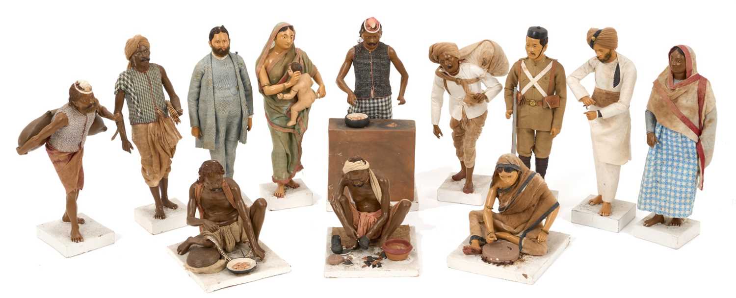 Lot 834 - Group of twelve Indian Company School terracotta figures, depicting various trades