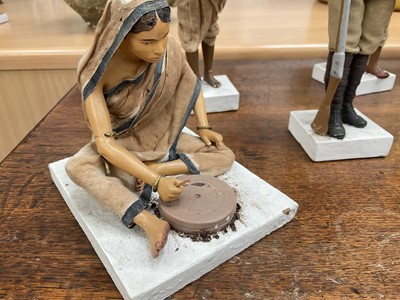 Lot 834 - Group of twelve Indian Company School terracotta figures, depicting various trades