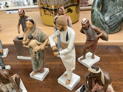 Lot 834 - Group of twelve Indian Company School terracotta figures, depicting various trades
