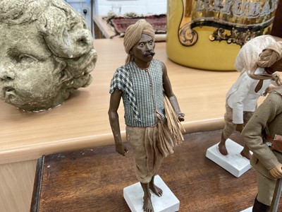 Lot 834 - Group of twelve Indian Company School terracotta figures, depicting various trades