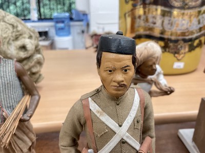 Lot 834 - Group of twelve Indian Company School terracotta figures, depicting various trades