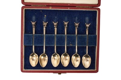 Lot 934 - Set of six silver coffee spoons with fox mask terminals, in fitted Swaine-Brigg case