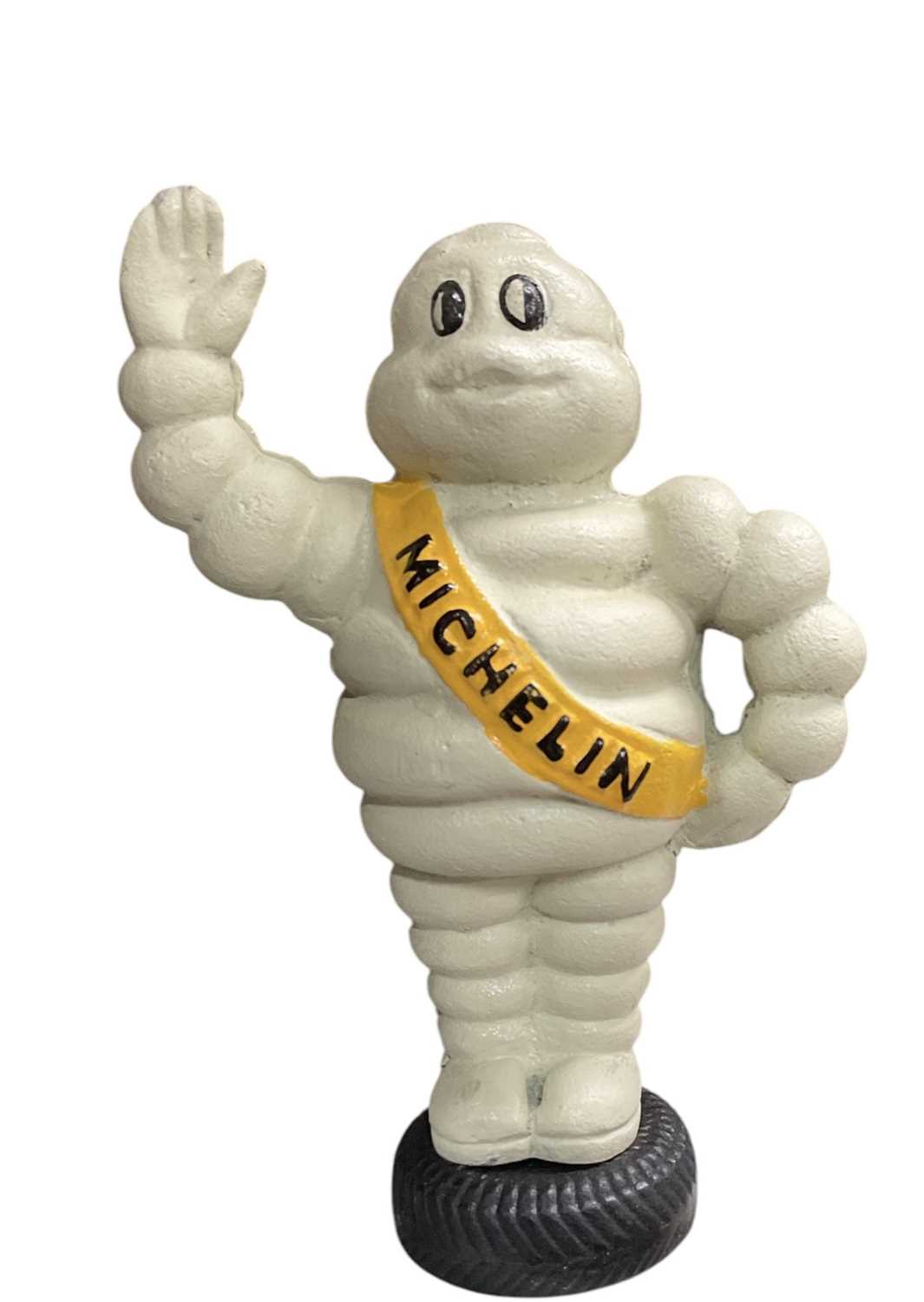 Lot 5 - Reproduction cast metal model of Mr Bibendum (The Michelin man), 23cm in overall height.