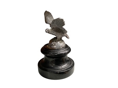 Lot 1 - Vintage chromium plated car mascot in the form of a bird of prey, mounted on an ebonised turned wood base, 14cm in height (including base).