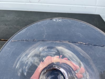 Lot 26 - Large Bohemian cut and engraved glass goblet and domed cover, circa 1730, well engraved with five putti around the body struggling with a heavy swag of pomegranates, grapes and other fruit, be...