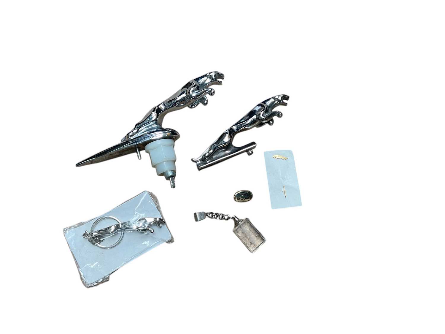 Lot 25 - Two Jaguar leaper mascots together with other Jaguar related collectables.