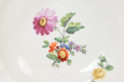 Lot 128 - Late 18th/early 19th century Berlin porcelain cup and saucer, painted with flowers, and a Frankenthal saucer (3)
