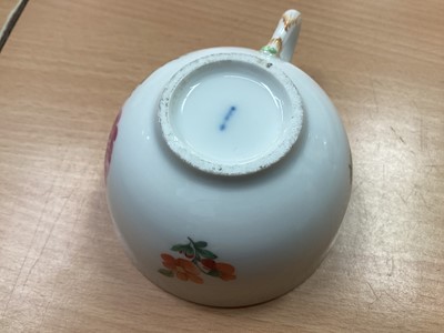 Lot 128 - Late 18th/early 19th century Berlin porcelain cup and saucer, painted with flowers, and a Frankenthal saucer (3)