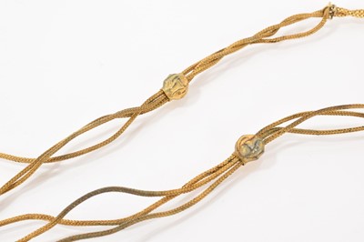 Lot 464 - Victorian yellow metal Celtic cross pendant on a gilt metal three strand chain