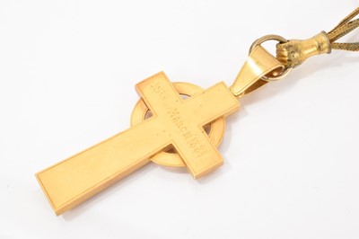Lot 464 - Victorian yellow metal Celtic cross pendant on a gilt metal three strand chain