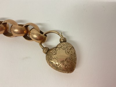 Lot 466 - Victorian gold bracelet with large, exaggerated belcher links and a heart shaped padlock clasp with glazed locket compartment