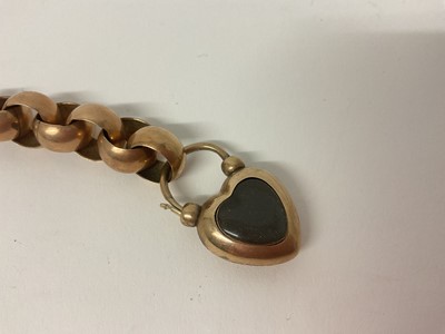 Lot 466 - Victorian gold bracelet with large, exaggerated belcher links and a heart shaped padlock clasp with glazed locket compartment
