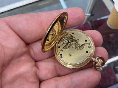 Lot 710 - Late 19th century 18ct gold full hunter fob watch