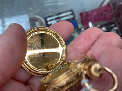 Lot 710 - Late 19th century 18ct gold full hunter fob watch