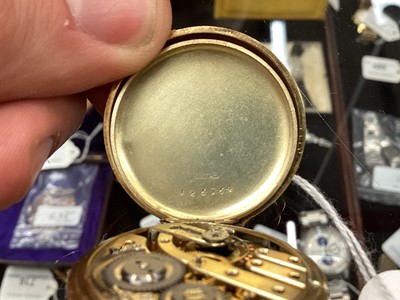 Lot 711 - 18ct gold half hunter fob watch
