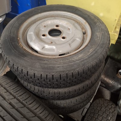 Lot 56 - Set of four French steel wheels and tyres (4).