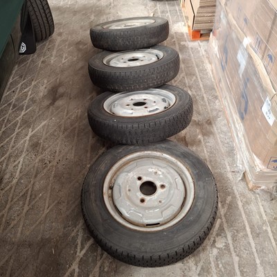 Lot 56 - Set of four French steel wheels and tyres (4).