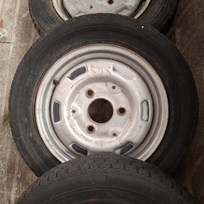 Lot 56 - Set of four French steel wheels and tyres (4).