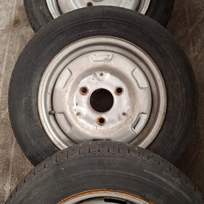 Lot 56 - Set of four French steel wheels and tyres (4).