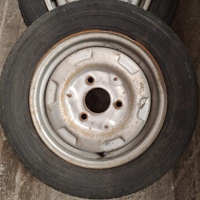 Lot 56 - Set of four French steel wheels and tyres (4).