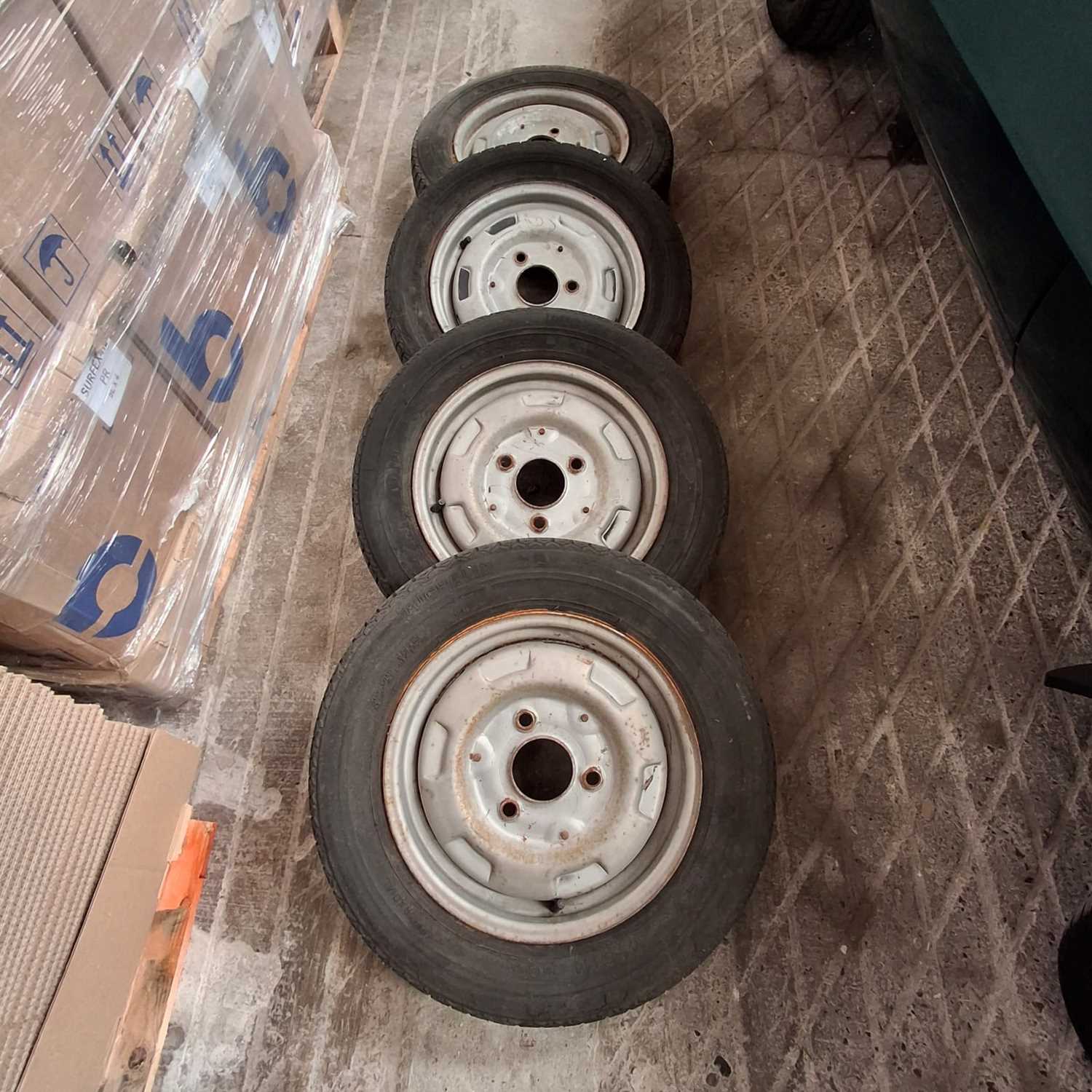 Lot 56 - Set of four French steel wheels and tyres (4).