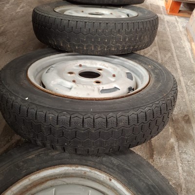 Lot 56 - Set of four French steel wheels and tyres (4).