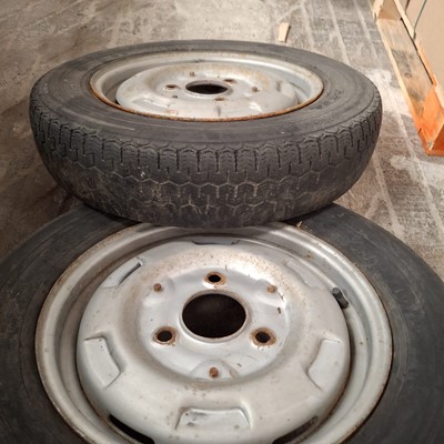 Lot 56 - Set of four French steel wheels and tyres (4).