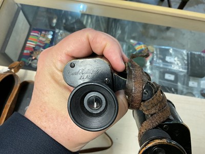 Lot 50 - Pair of First World War Officer's private purchase binoculars in black painted finish, engraved Carl Zeiss Zena D.R.P., in brown leather case. Provenance: formerly the property of Brigadi...