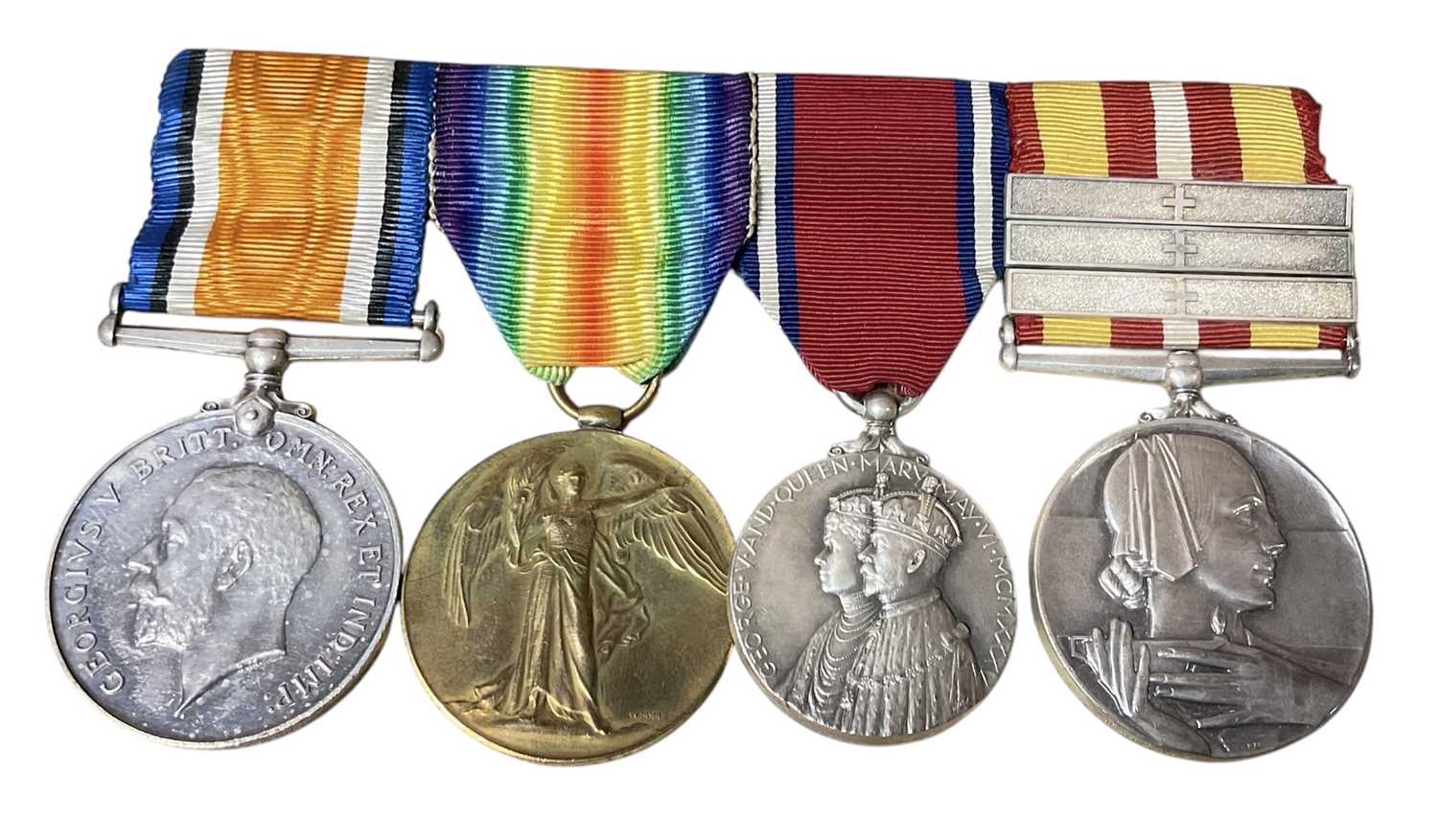 Lot 52 - First World War and later Nursing medal group comprising War and Victory medals named to M. B. Erskine, George V 1935 Silver Jubilee medal and Voluntary Medical Service medal with three bars nam...