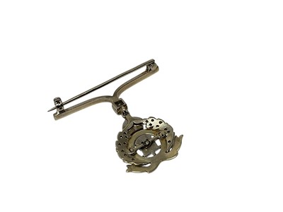 Lot 63 - Fine First World War Suffolk Regiment sweetheart brooch, bar set with central diamond with enamel and Rose cut diamond set regimental badge suspended on a pendant mount, set in yellow metal.