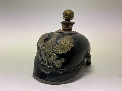 Lot 108 - First World War Imperial German Prussian Artillery Other Rank Picklehaube helmet, with a Prussian eagle plate to front and black leather headband.
