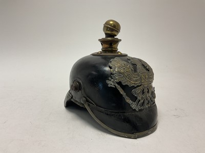 Lot 108 - First World War Imperial German Prussian Artillery Other Rank Picklehaube helmet, with a Prussian eagle plate to front and black leather headband.