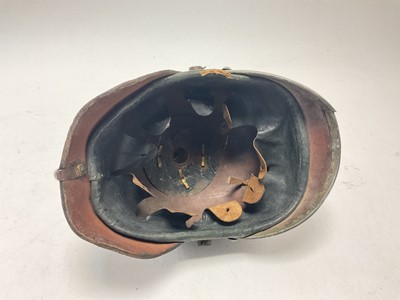Lot 108 - First World War Imperial German Prussian Artillery Other Rank Picklehaube helmet, with a Prussian eagle plate to front and black leather headband.