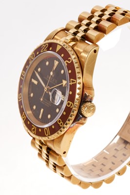 Lot 692 - Rolex GMT Master with box and papers