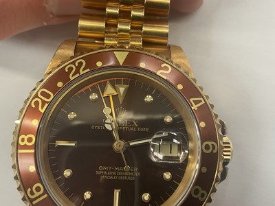 Lot 692 - Rolex GMT Master with box and papers